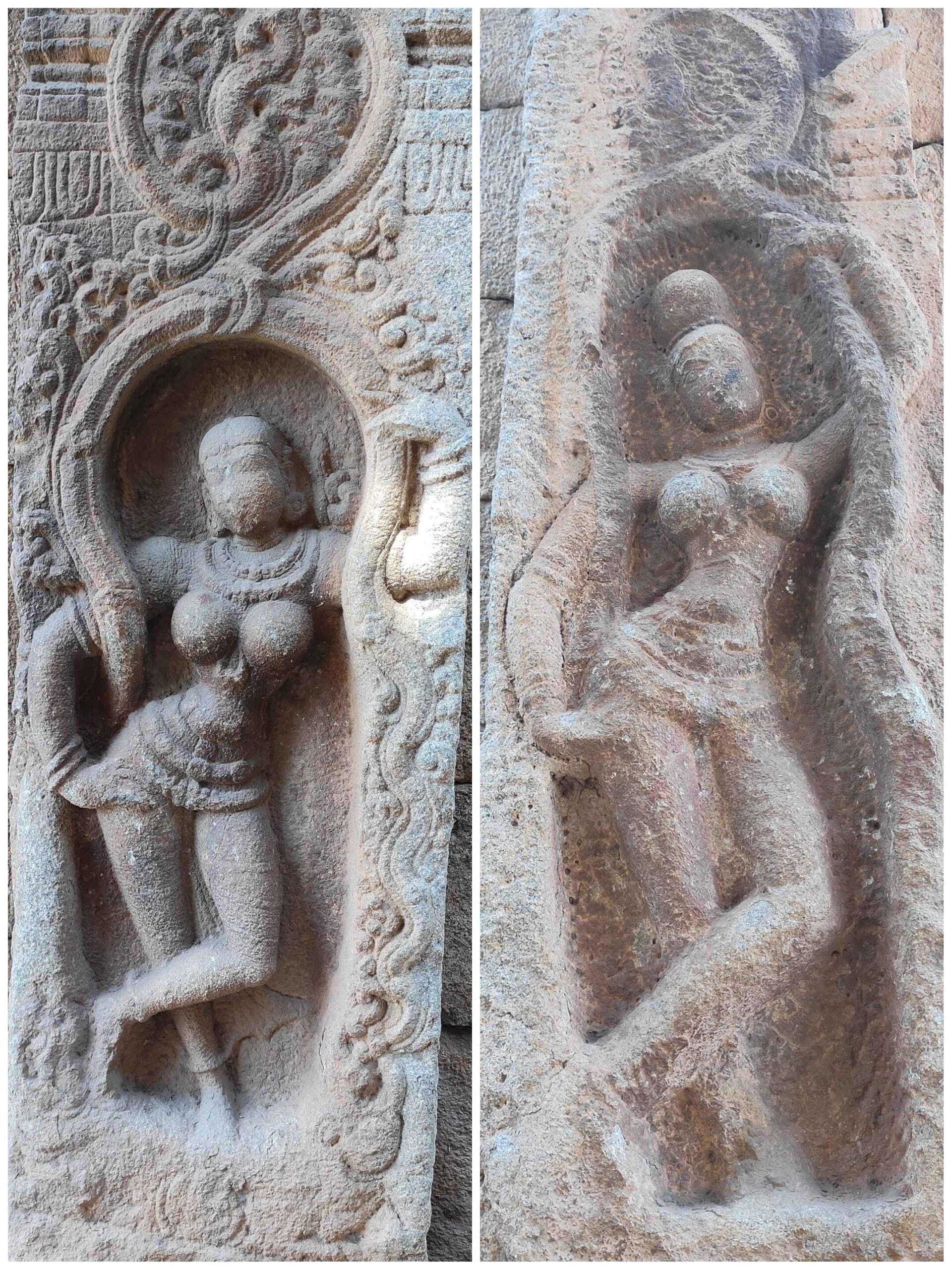 Beautiful women sculptures on the entrance's large stone pillars