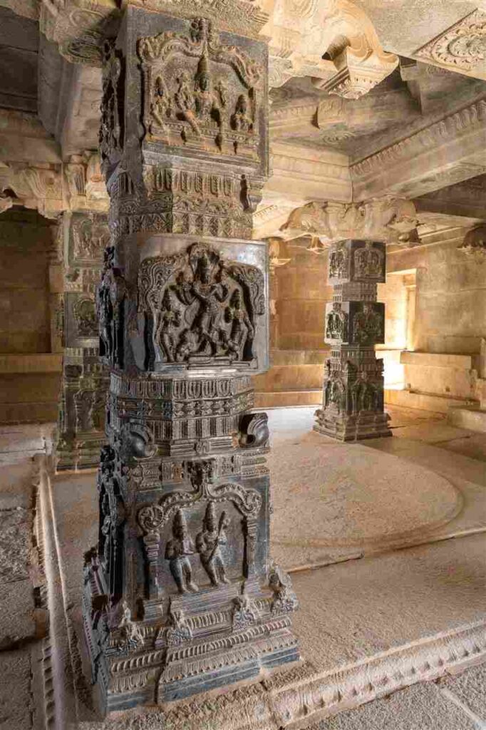 Beautifully carved sculptures on polished schist stone pillars