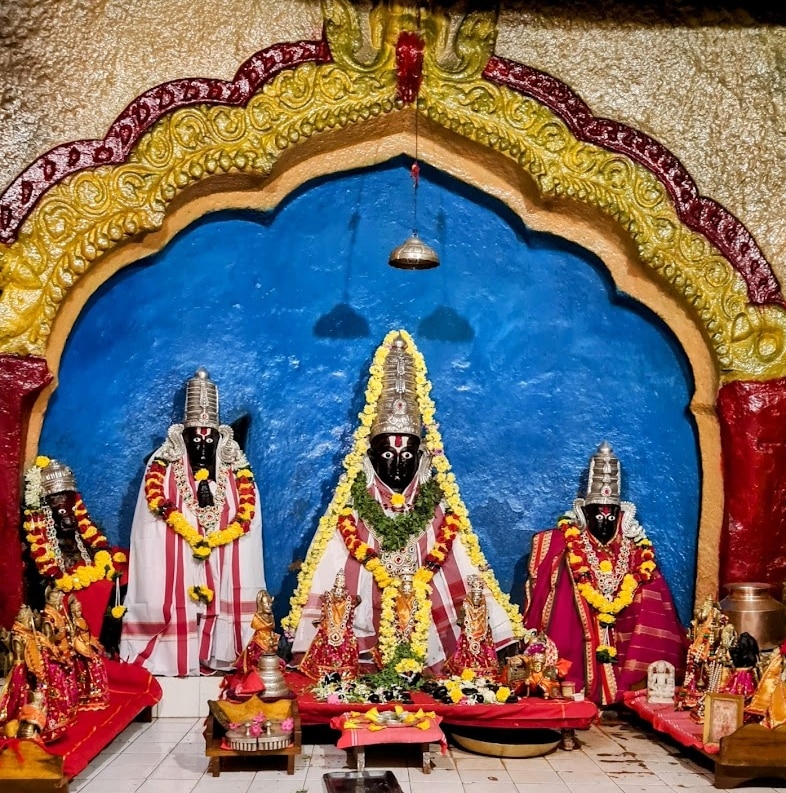 Black granite idols of Lord Rama, Lakshmana, Sita, and Hanuman inside the sanctum sanctorum