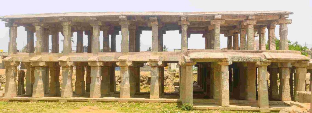 In Hampi Bazaar, double-storied pavilions with ruins - 1