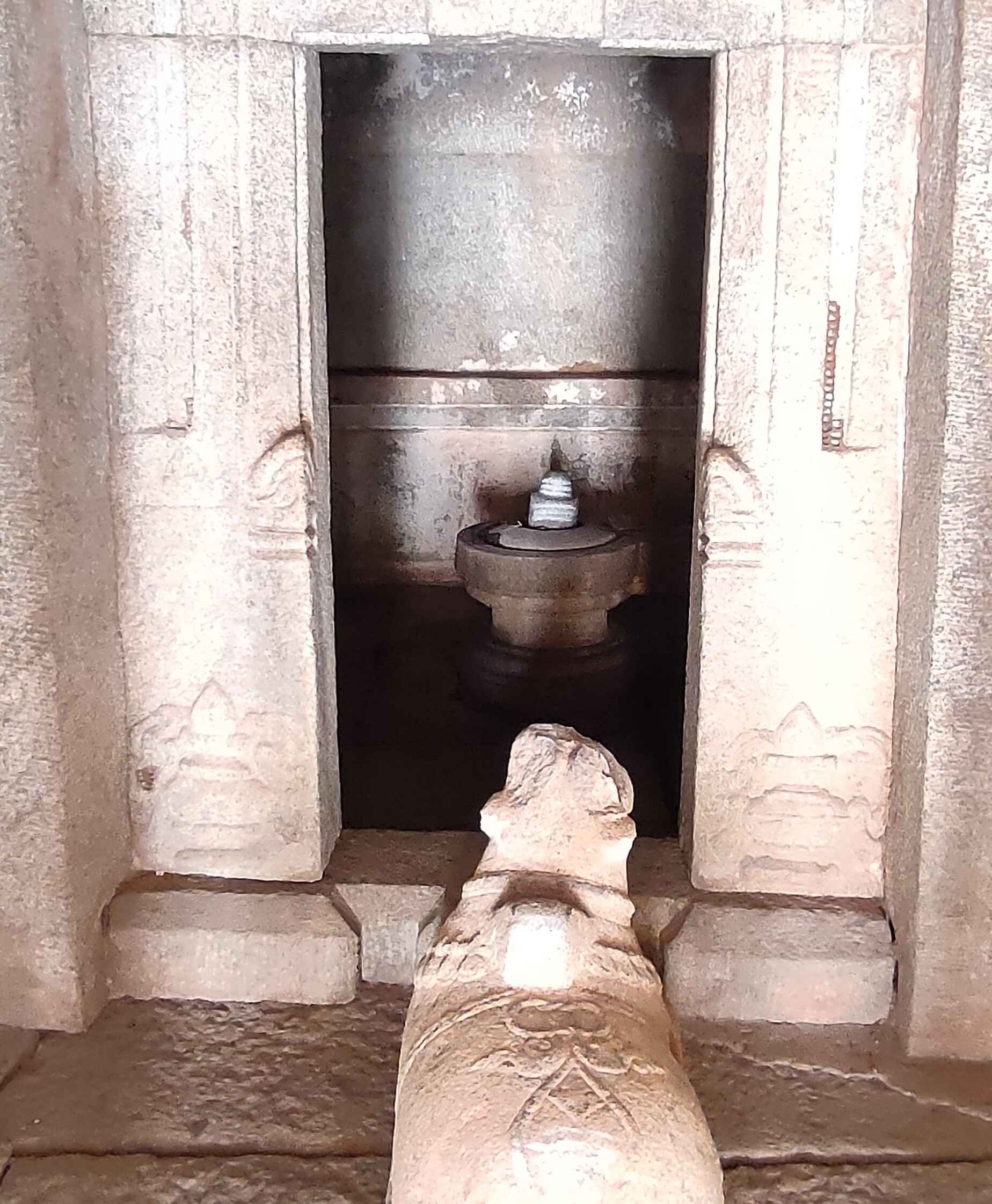 In the Varaha Temple, the idol of Shiva Lingam in the sanctum sanctorum, with the opposite statue of Nandi