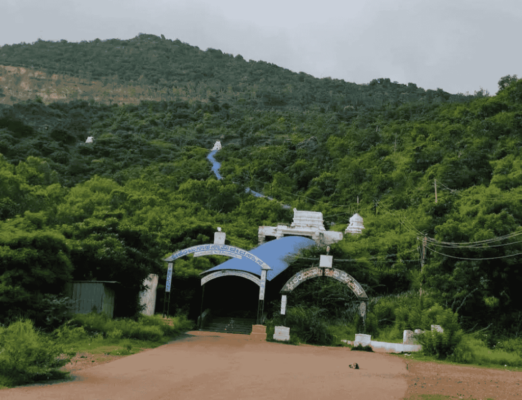 Jambunatha Temple entrance with a blue roof and st