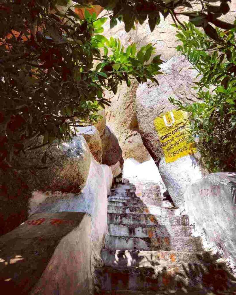 Pathway of steps amidst lush green surroundings at Anjanadri Hill