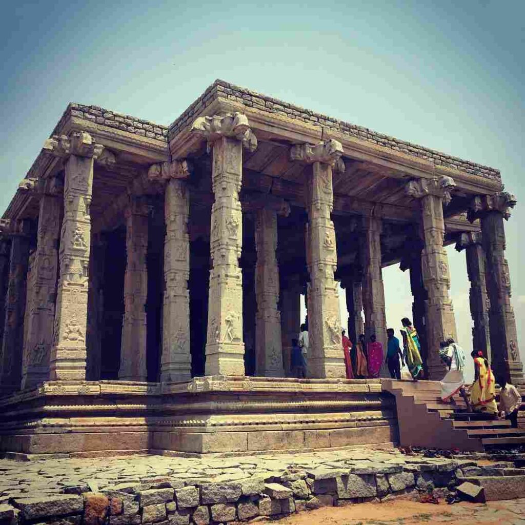 Tall stone-pillared mandapam in Kadalekalu Ganesh Temple